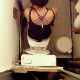 A hidden camera in a bathroom ceiling records a girl taking a shit. A nice, long turd is visible in the toilet as she wipes her ass. Presented in 720P HD. About 2 minutes.